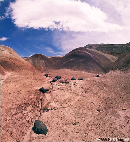 bentonitehillsontheroadtocathedralvalleycapitolreefnputah2001.jpg